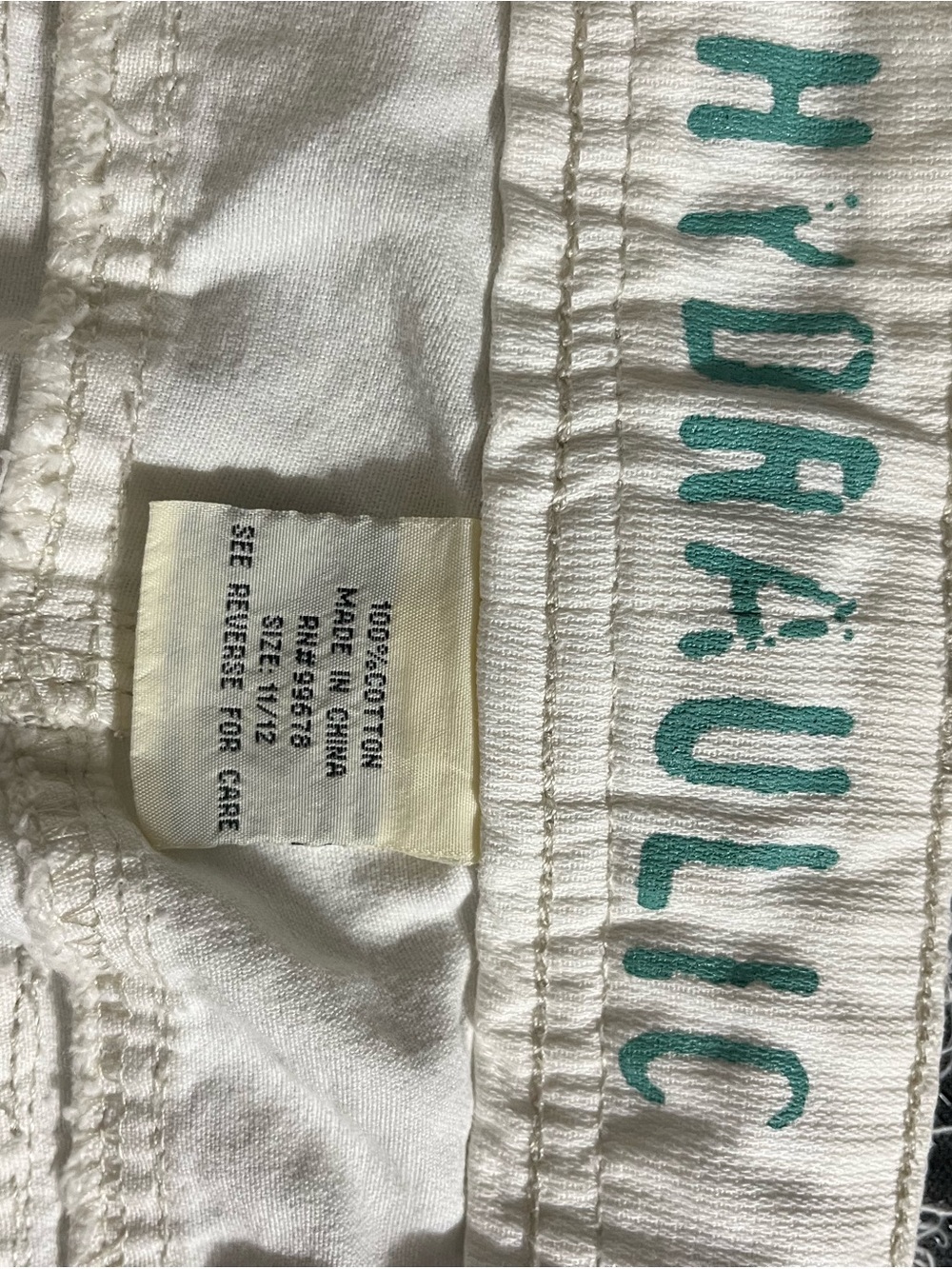 Hydraulic White Cotton Shorts with Teal Logo
